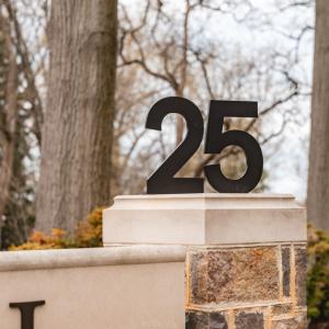 Photo of Lehigh Unviersity sign with the number 25 on a pillar, denoting this graduation year