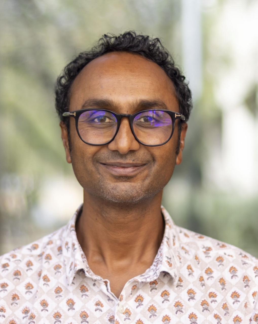 Head shot photo of Professor DDhiraj Murthy, the Lucy G Moses Distinguished Professor of Sociology